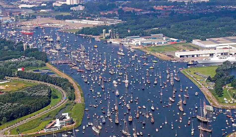 Aerial view of a harbor filled with boats and ships.