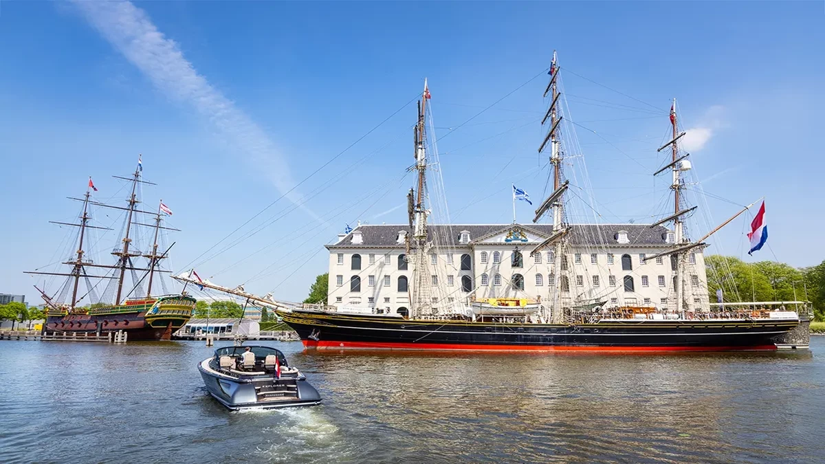 Historic tall ships docked near the National Maritime Museum in Amsterdam.