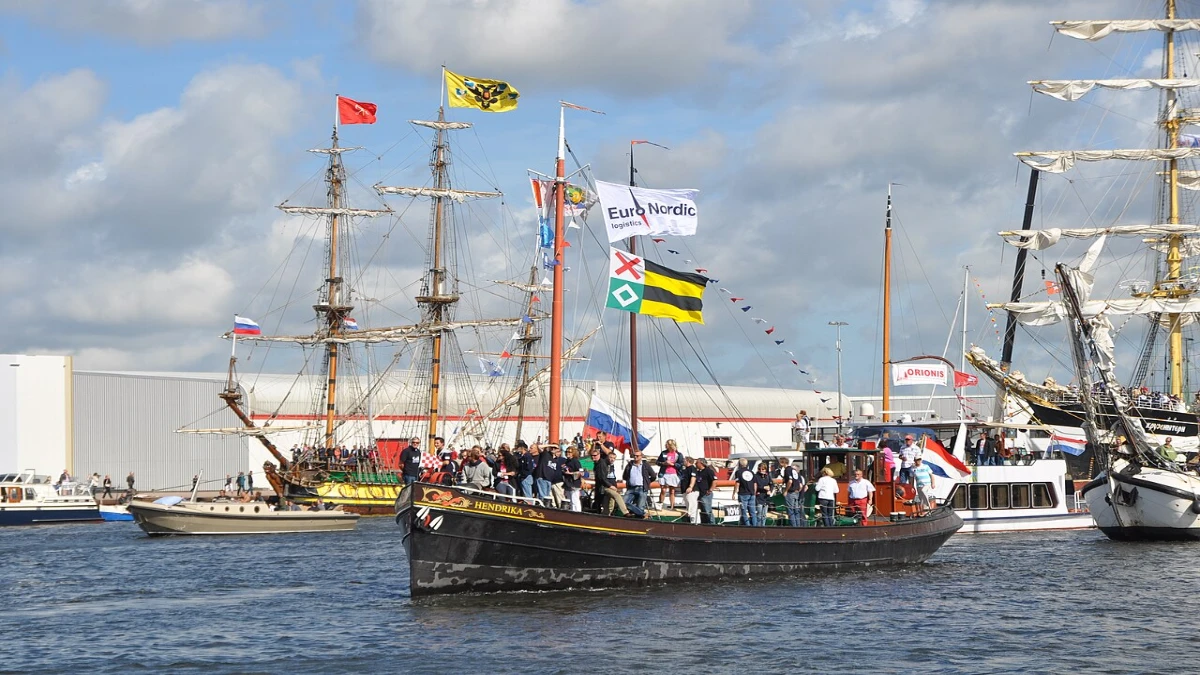 Decorated ships with flags during maritime celebration in Amsterdam
